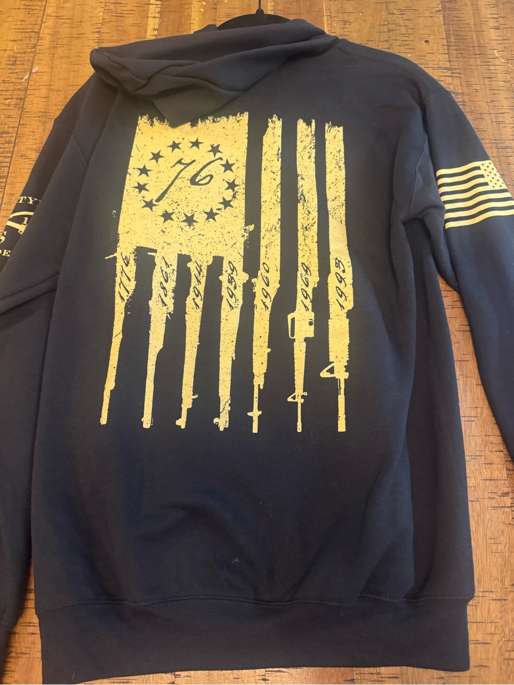 Grunt Style Black Zip-Up Hoodie with Distressed Gold Flag Betsy Rifle Flag 76